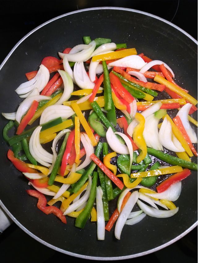 Fajita veggies in pan